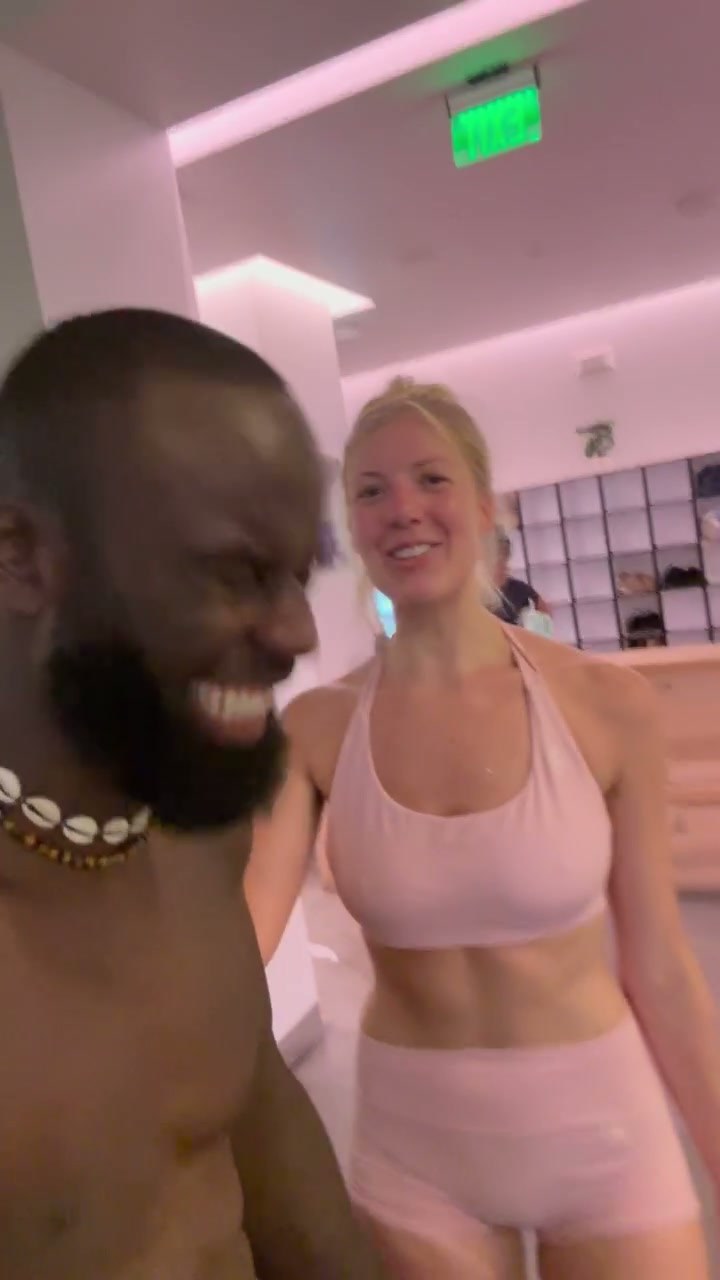Mo celebrating with a member after class